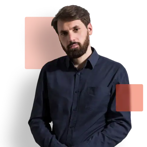 Employment law Serious-looking man in a dark button-down shirt standing against a neutral background with red graphic elements, representing an employee facing workplace legal issues